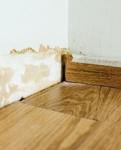 water damage leak behind skirting [location]